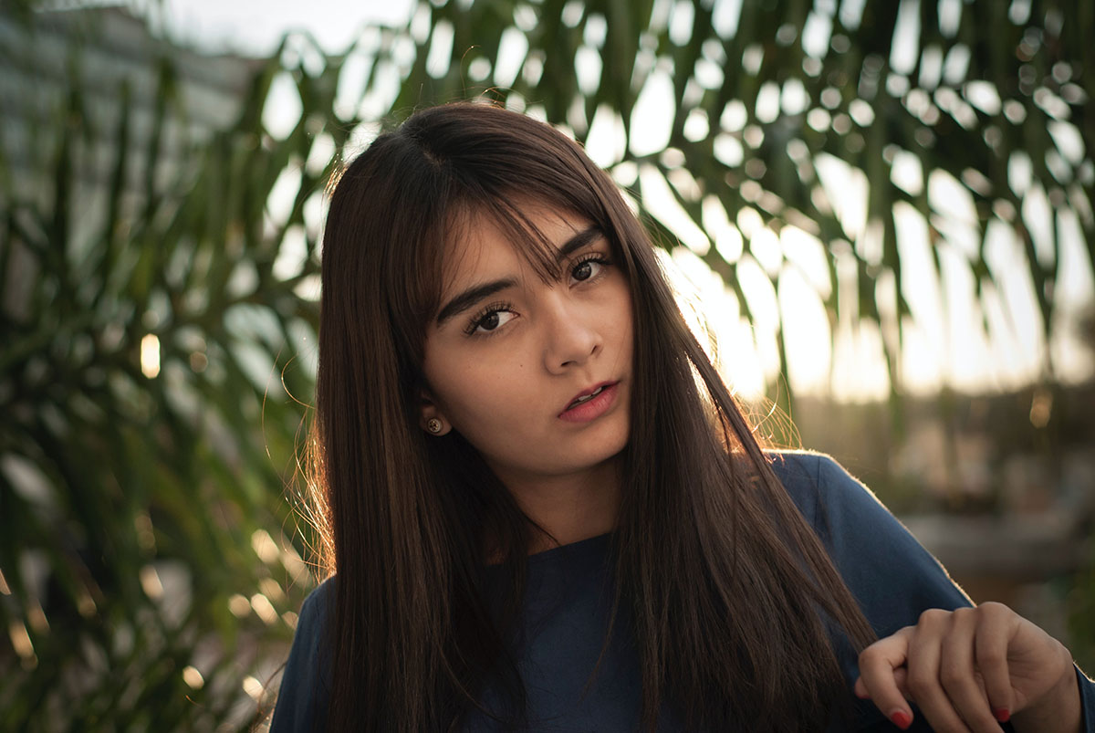 A woman thinking about why her friends and family are pressuring her into abortion